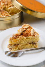 Load image into Gallery viewer, NEW Orange Pili Crunch Cake
